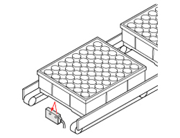 Positioning of trays